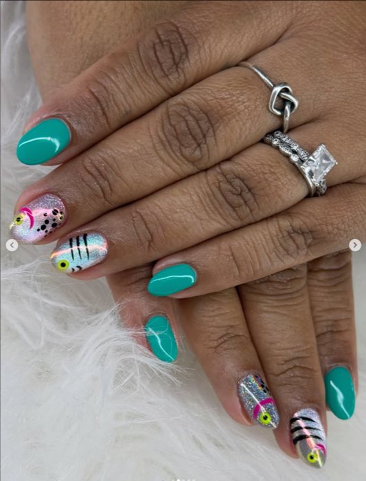 Teal nails with holographic accent nail art